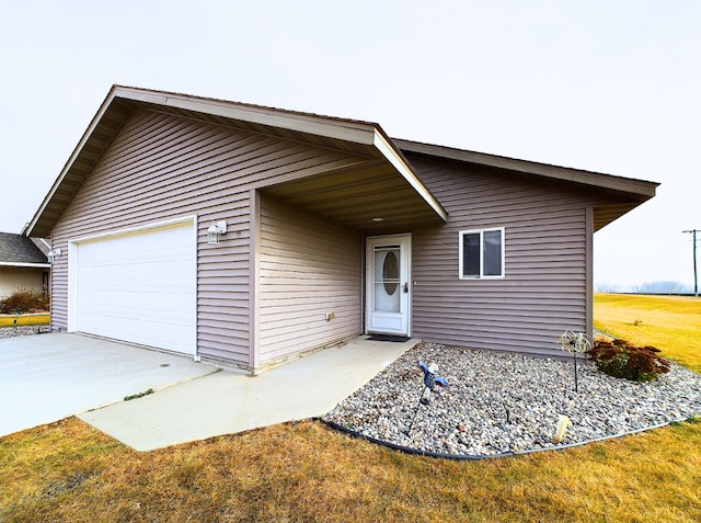 single story home with a garage