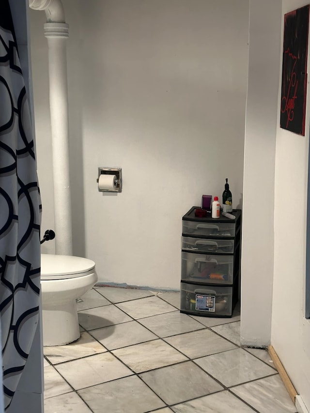 bathroom featuring toilet