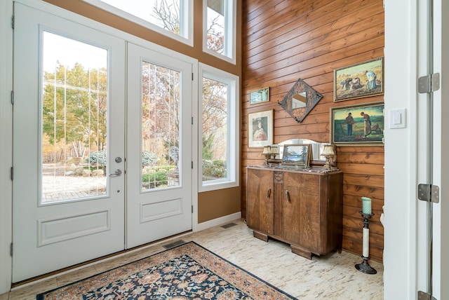 5441 Raven Point Rd, Spring Lake Twp, MN 55372 - doorway with french doors and wooden walls