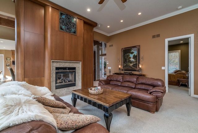 5441 Raven Point Rd, Spring Lake Twp, MN 55372 - carpeted living area with crown molding, a ceiling fan, recessed lighting, and a glass covered fireplace