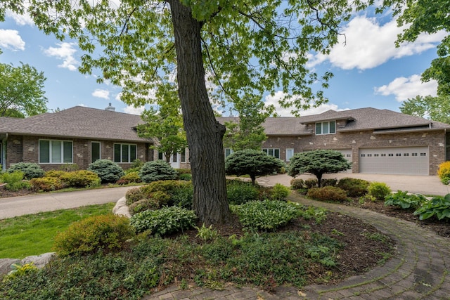 5441 Raven Point Rd, Spring Lake Twp, MN 55372 - view of front of property with brick siding, driveway, and a garage
