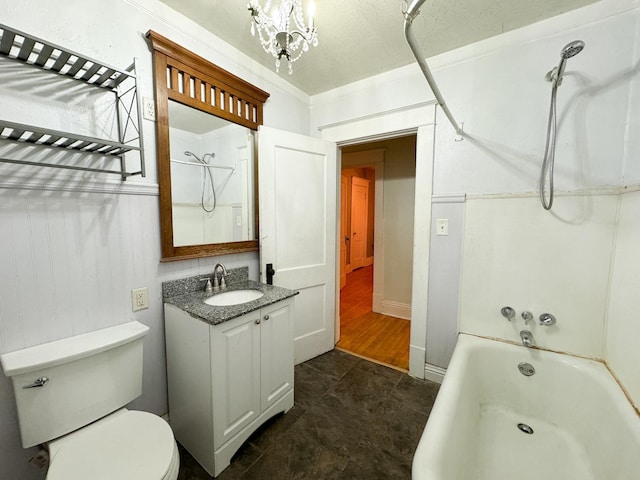 full bathroom featuring toilet, a textured ceiling, vanity, crown molding, and tub / shower combination