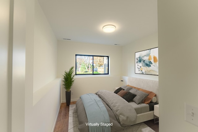 bedroom featuring light hardwood / wood-style floors