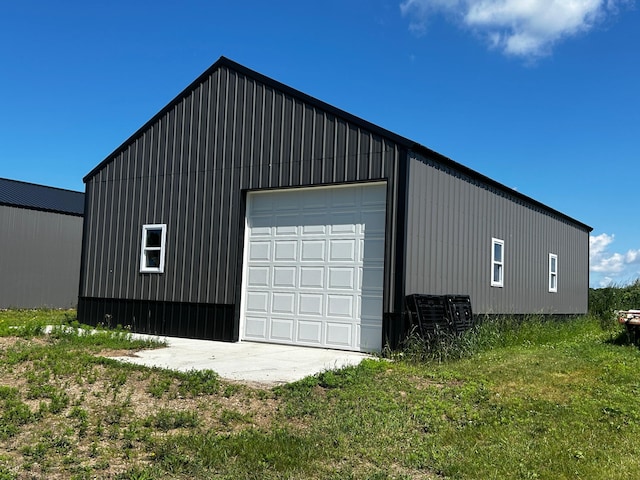 garage with a lawn