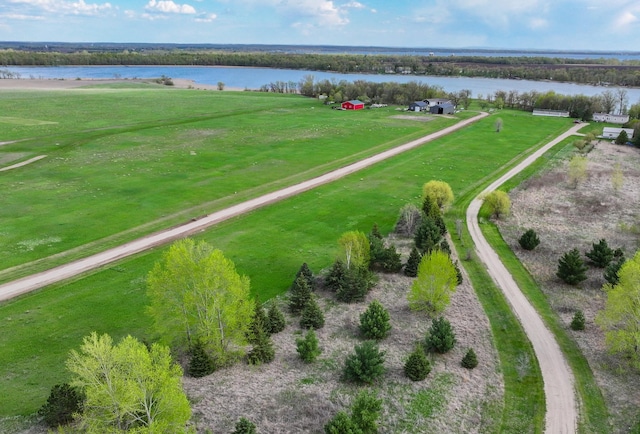 aerial view with a rural view and a water view