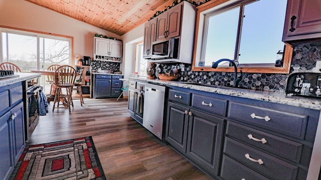 kitchen with lofted ceiling, wooden ceiling, dark hardwood / wood-style floors, stainless steel appliances, and decorative backsplash