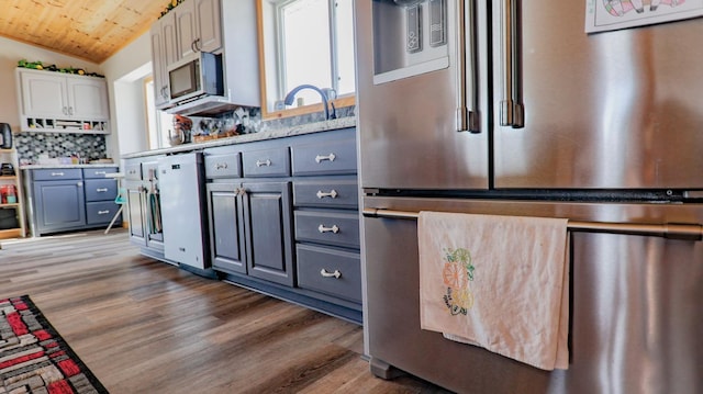 kitchen featuring gray cabinets, dark hardwood / wood-style floors, white cabinetry, stainless steel appliances, and wooden ceiling