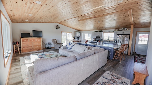 living room featuring wood ceiling, vaulted ceiling, and dark hardwood / wood-style floors