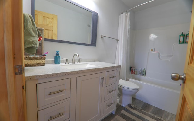 full bathroom featuring toilet, vanity, shower / bathtub combination with curtain, and wood-type flooring