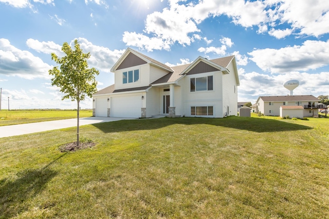 view of front of home with a garage and a front lawn