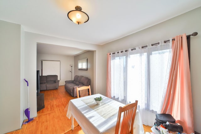 dining room with hardwood / wood-style floors