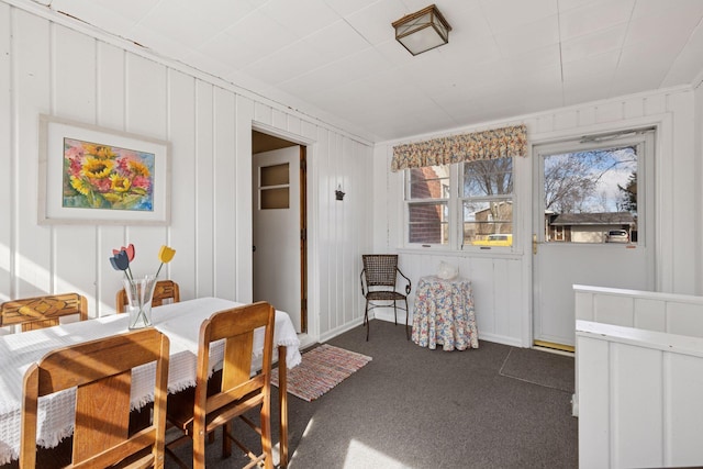 dining space with dark carpet