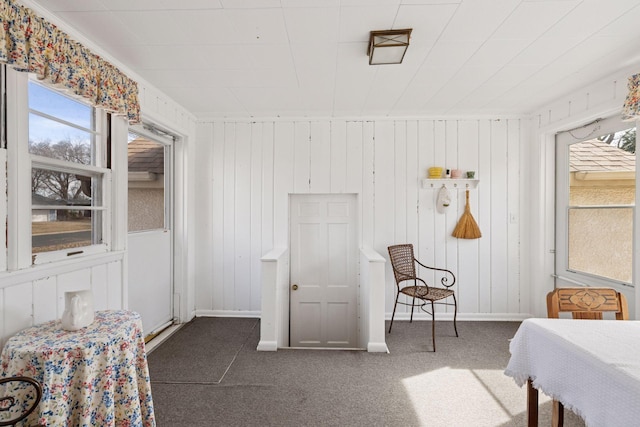 bedroom with baseboards and carpet floors