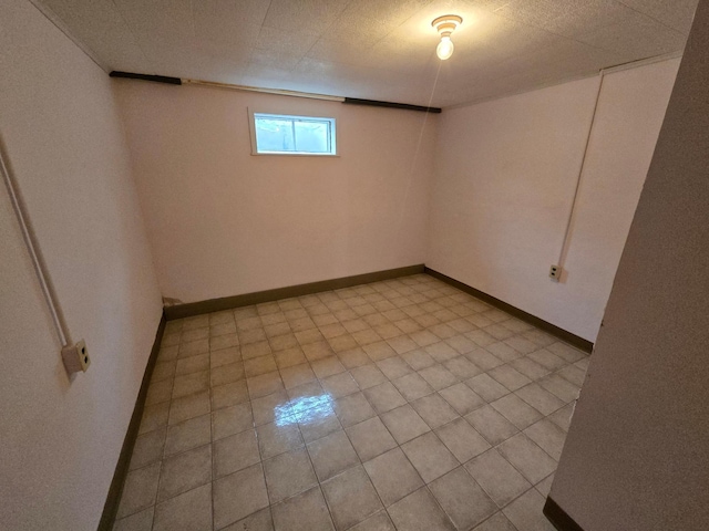 basement with light tile patterned floors