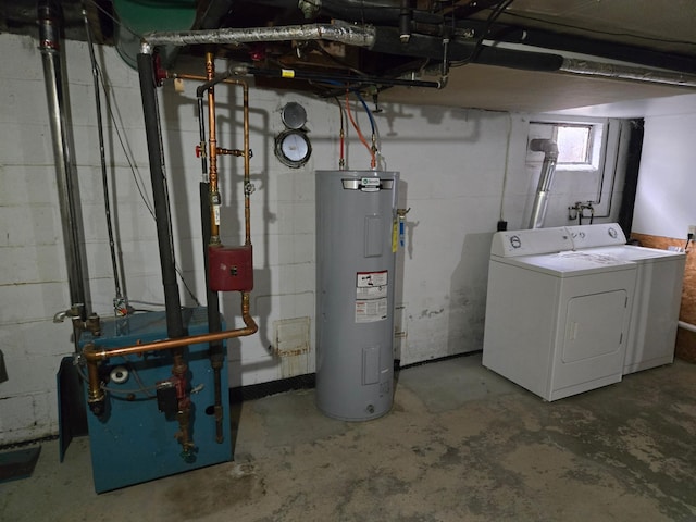 interior space featuring electric water heater and washer and dryer