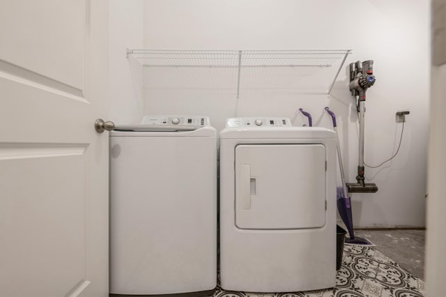 laundry room with independent washer and dryer