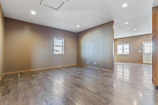 spare room featuring hardwood / wood-style floors