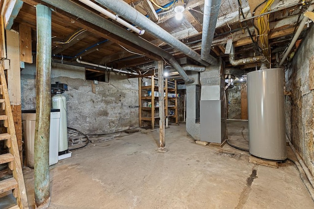 basement featuring water heater and heating unit