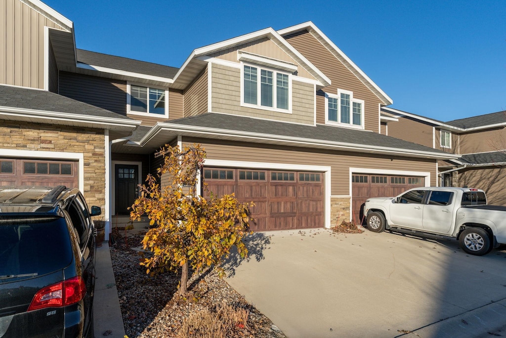 view of front of property with a garage