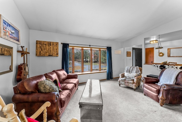 living room featuring lofted ceiling and carpet floors