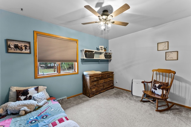 carpeted bedroom featuring ceiling fan