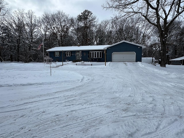 single story home featuring a garage