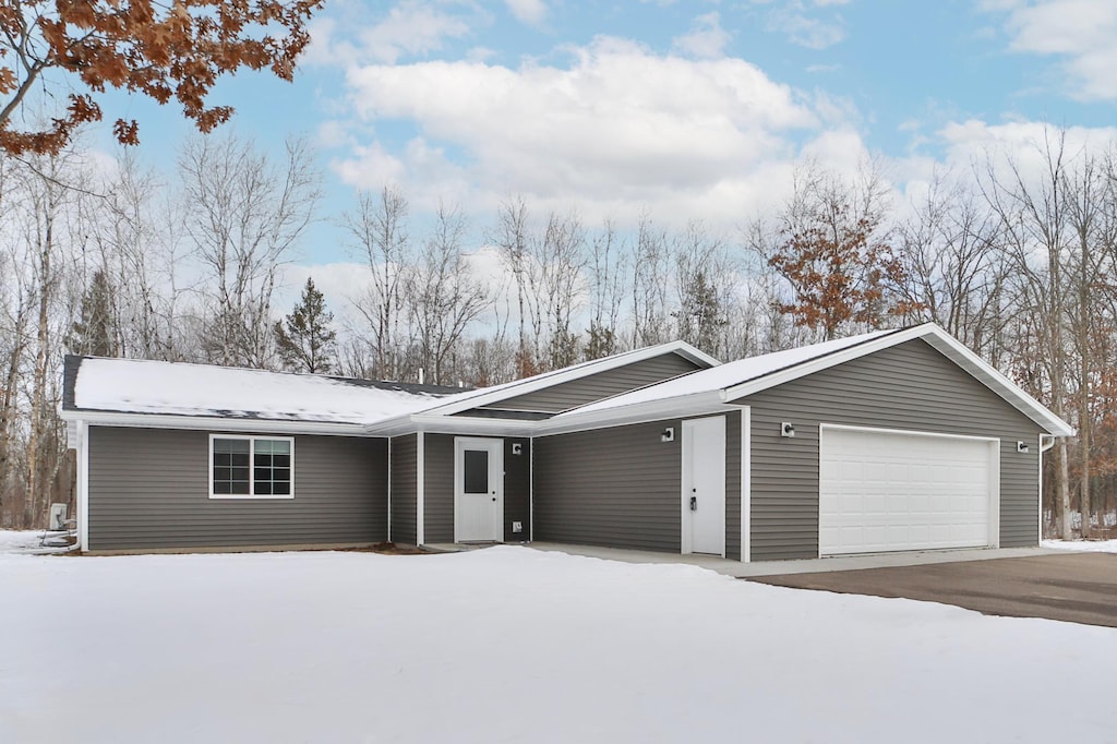 ranch-style house with a garage