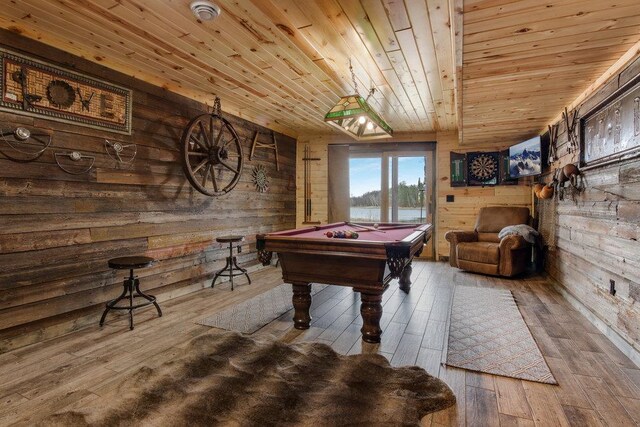 playroom with wood walls, hardwood / wood-style flooring, wooden ceiling, and billiards