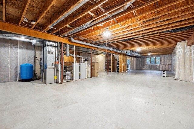 basement with heating unit and gas water heater