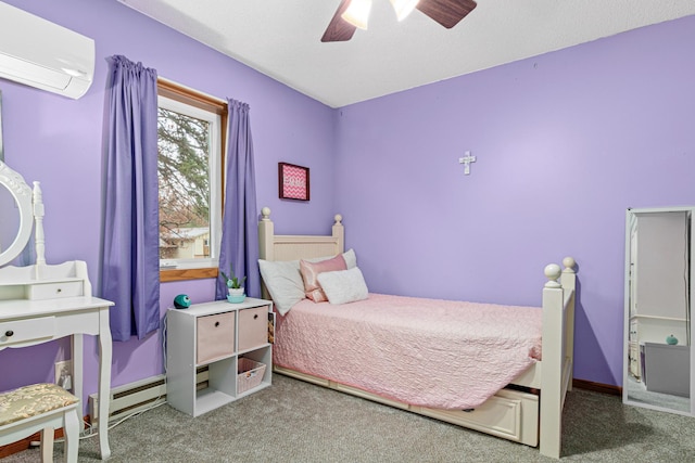 carpeted bedroom with ceiling fan, a baseboard heating unit, and a wall unit AC