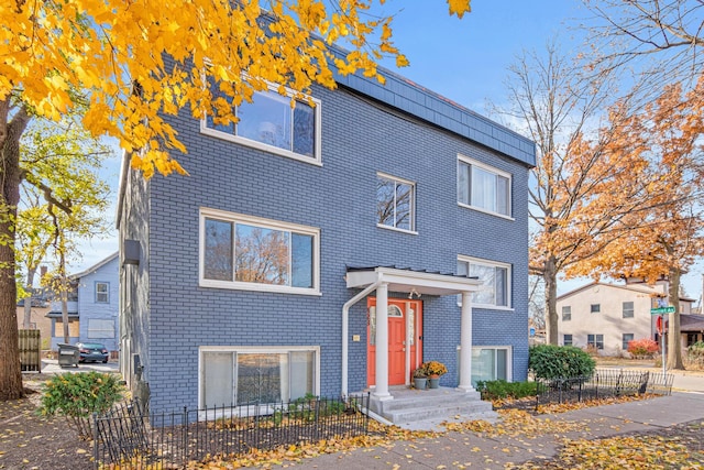 view of front of home with solar panels