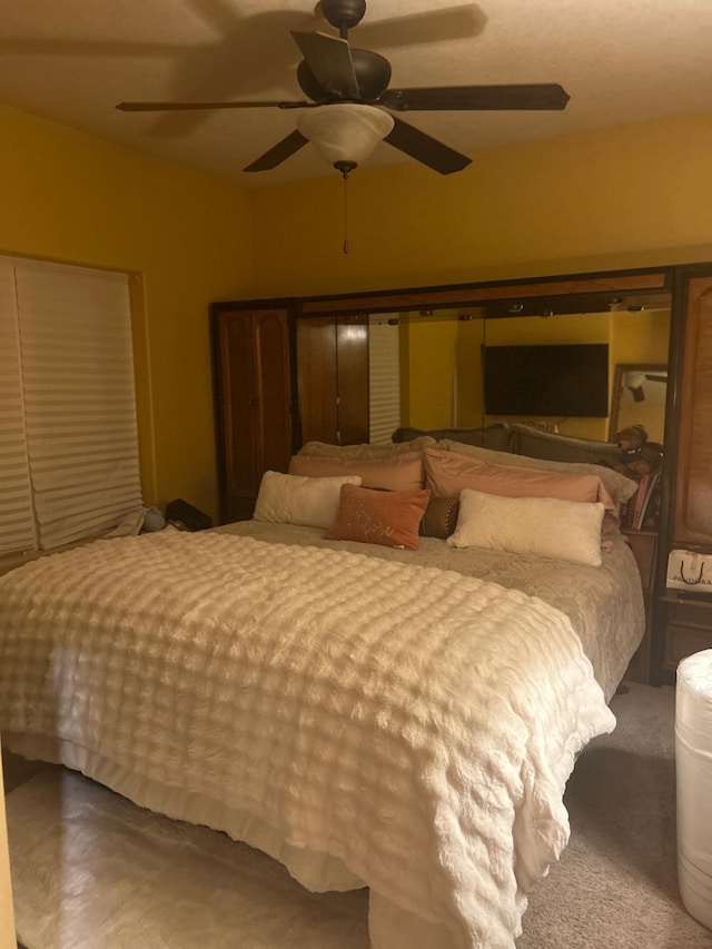 bedroom featuring carpet floors and ceiling fan