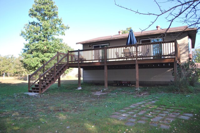 12303 71st Ave SW, Motley, MN 56466 - rear view of house featuring a deck, stairs, and a lawn