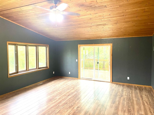 12303 71st Ave SW, Motley, MN 56466 - empty room featuring vaulted ceiling, wooden ceiling, ceiling fan, wood finished floors, and baseboards