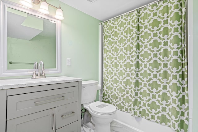 full bathroom with vanity, toilet, and shower / tub combo with curtain