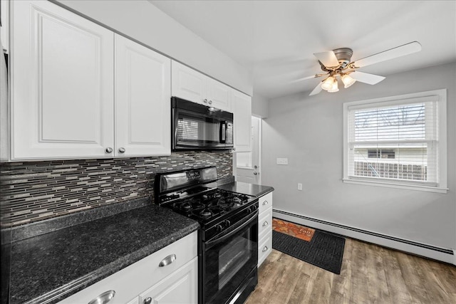 kitchen featuring black appliances, light wood-type flooring, white cabinetry, and a baseboard radiator