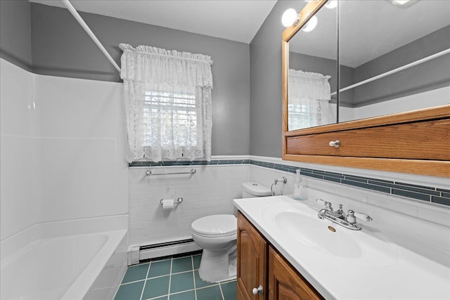 full bathroom with vanity, a baseboard heating unit, tile patterned floors, toilet, and tile walls