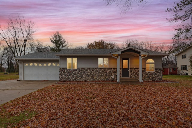 ranch-style home with a garage