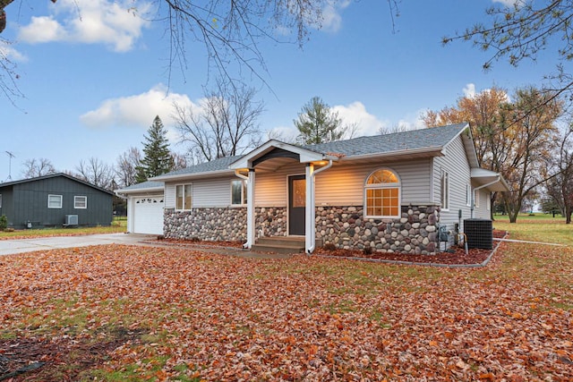 single story home with a garage and a porch