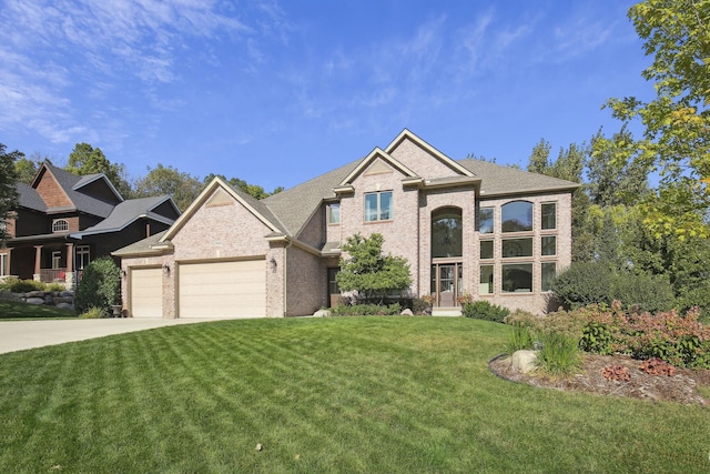 view of front of home with a garage, concrete driveway, brick siding, and a front lawn