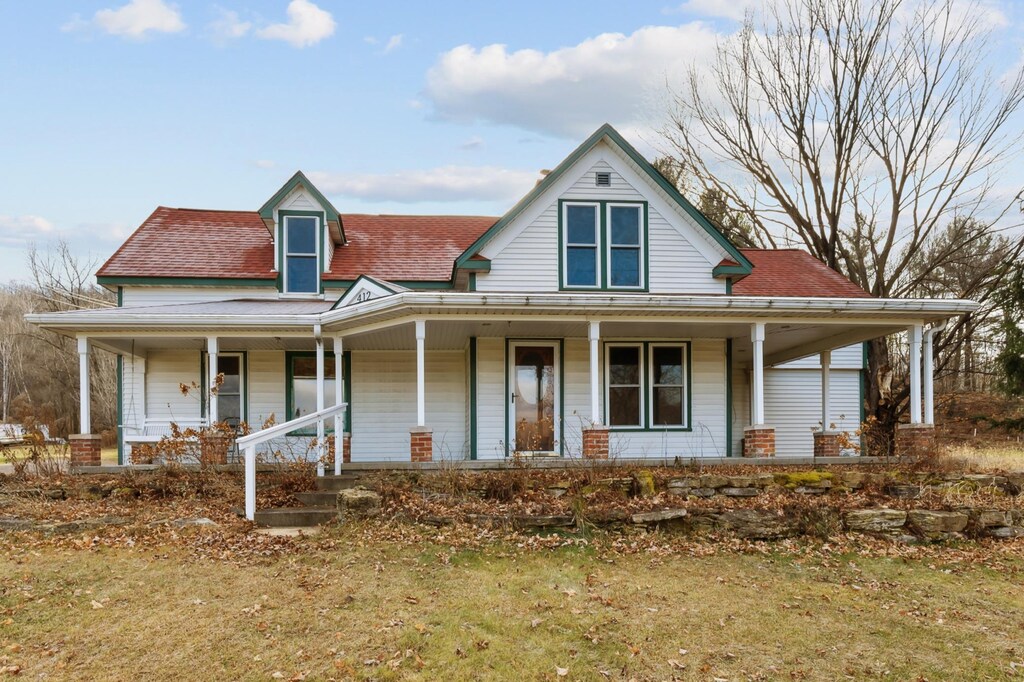 412 Miller St, Knapp, WI 54749 - farmhouse inspired home featuring a porch