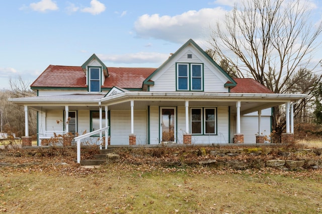 farmhouse inspired home featuring a porch