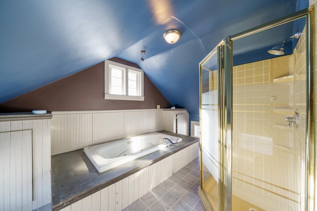 bathroom with vaulted ceiling and shower with separate bathtub