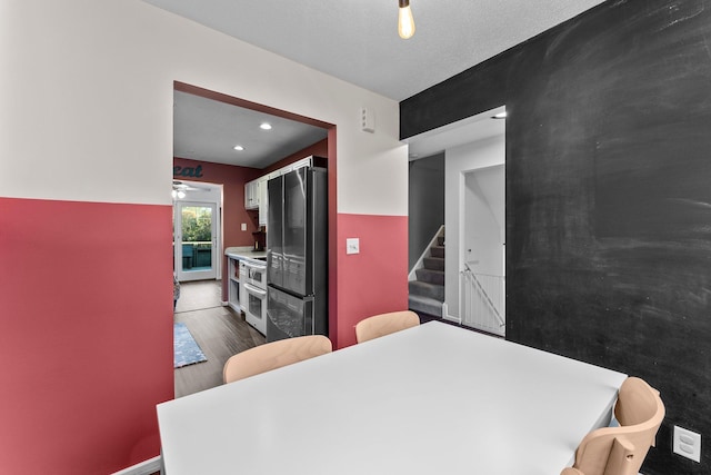 dining area featuring dark hardwood / wood-style flooring