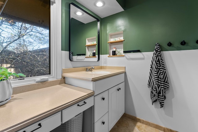 bathroom with vanity and tile patterned floors