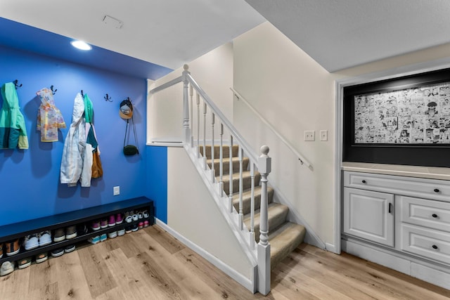 mudroom with light wood-type flooring