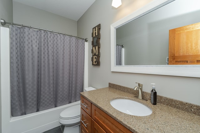 full bathroom featuring toilet, vanity, and shower / bath combo with shower curtain