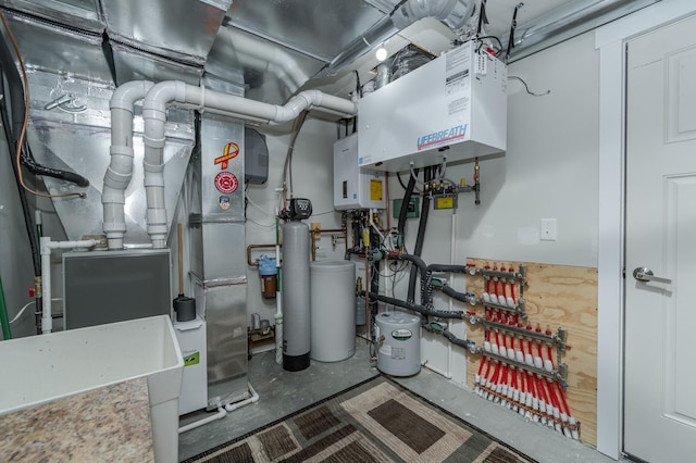 utility room featuring water heater