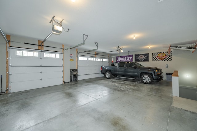 garage featuring a garage door opener