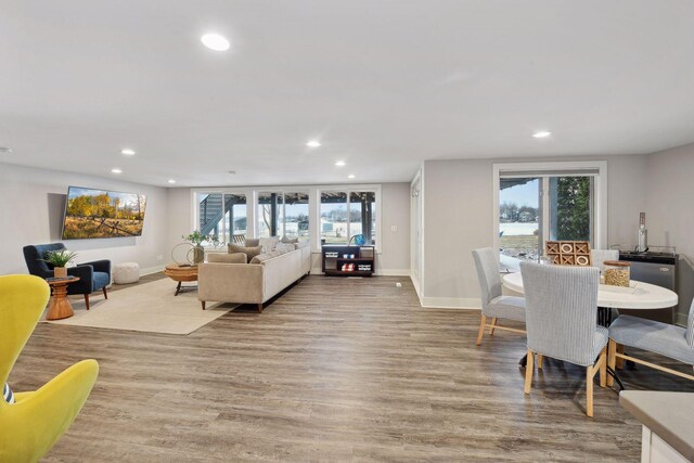 living room with light hardwood / wood-style floors